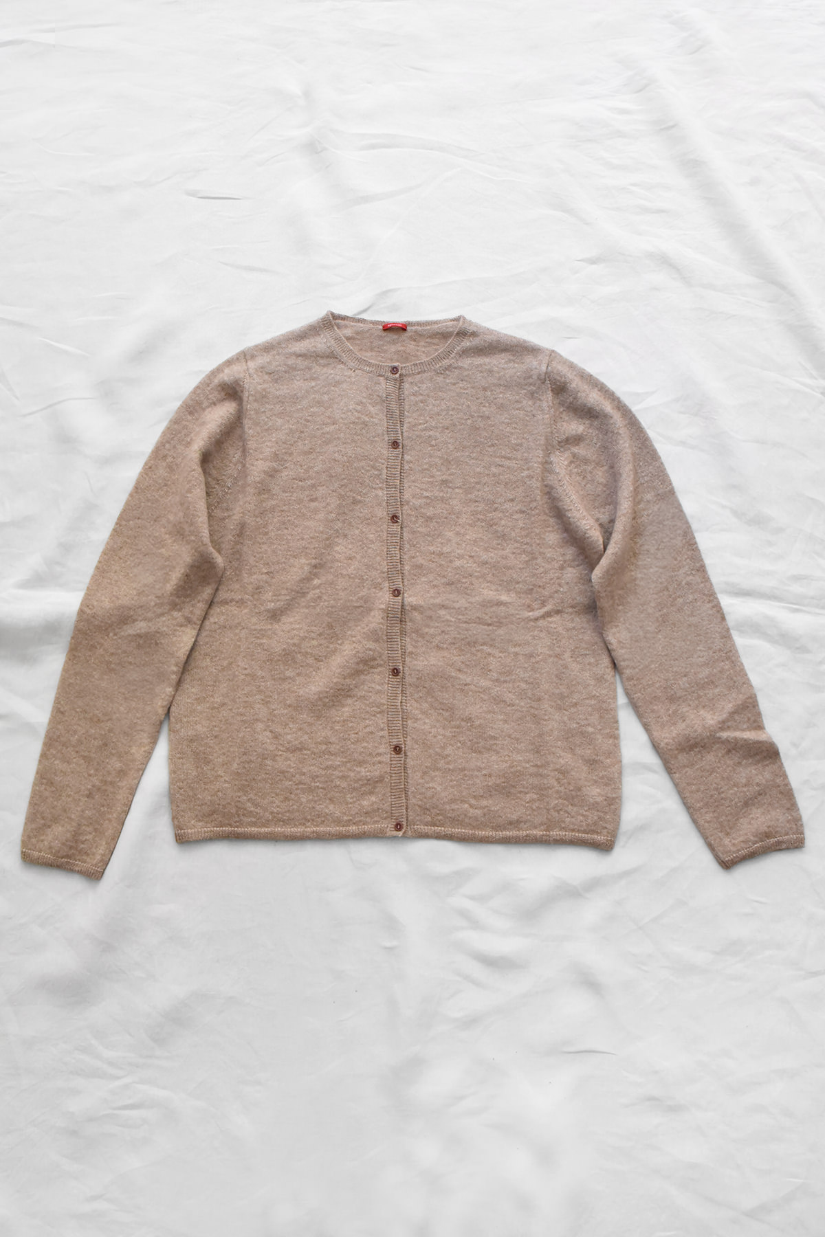 Apuntob (a.b) P1914 Cardigan - Candy, a beige crew-neck cardigan with a button-front closure.